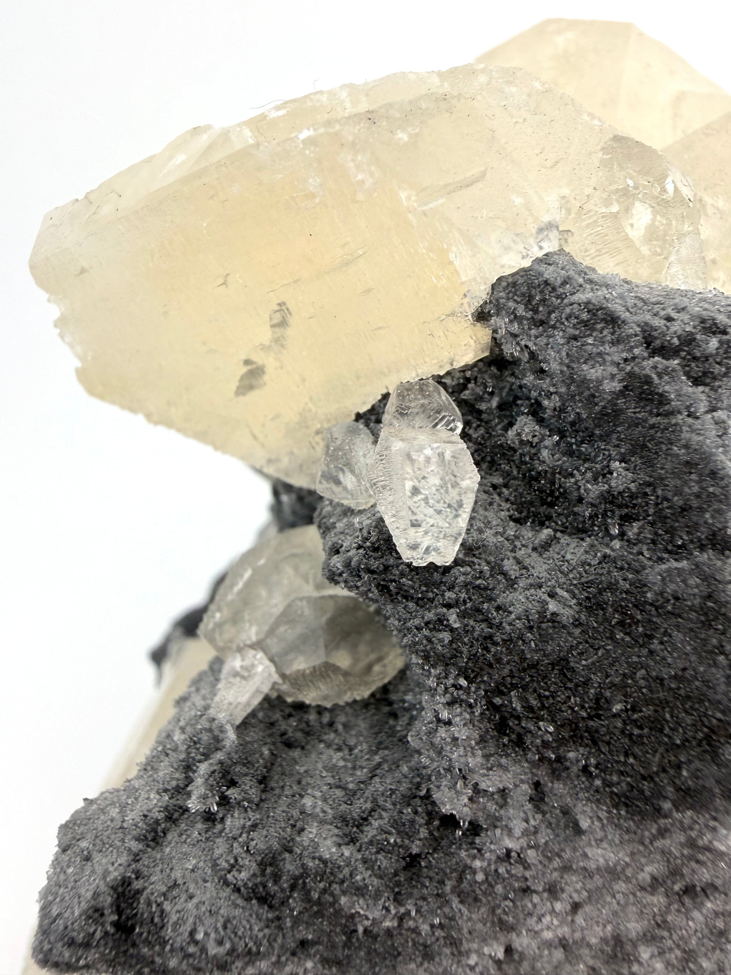 White Stepped “Benz” Calcite on Chalcedony