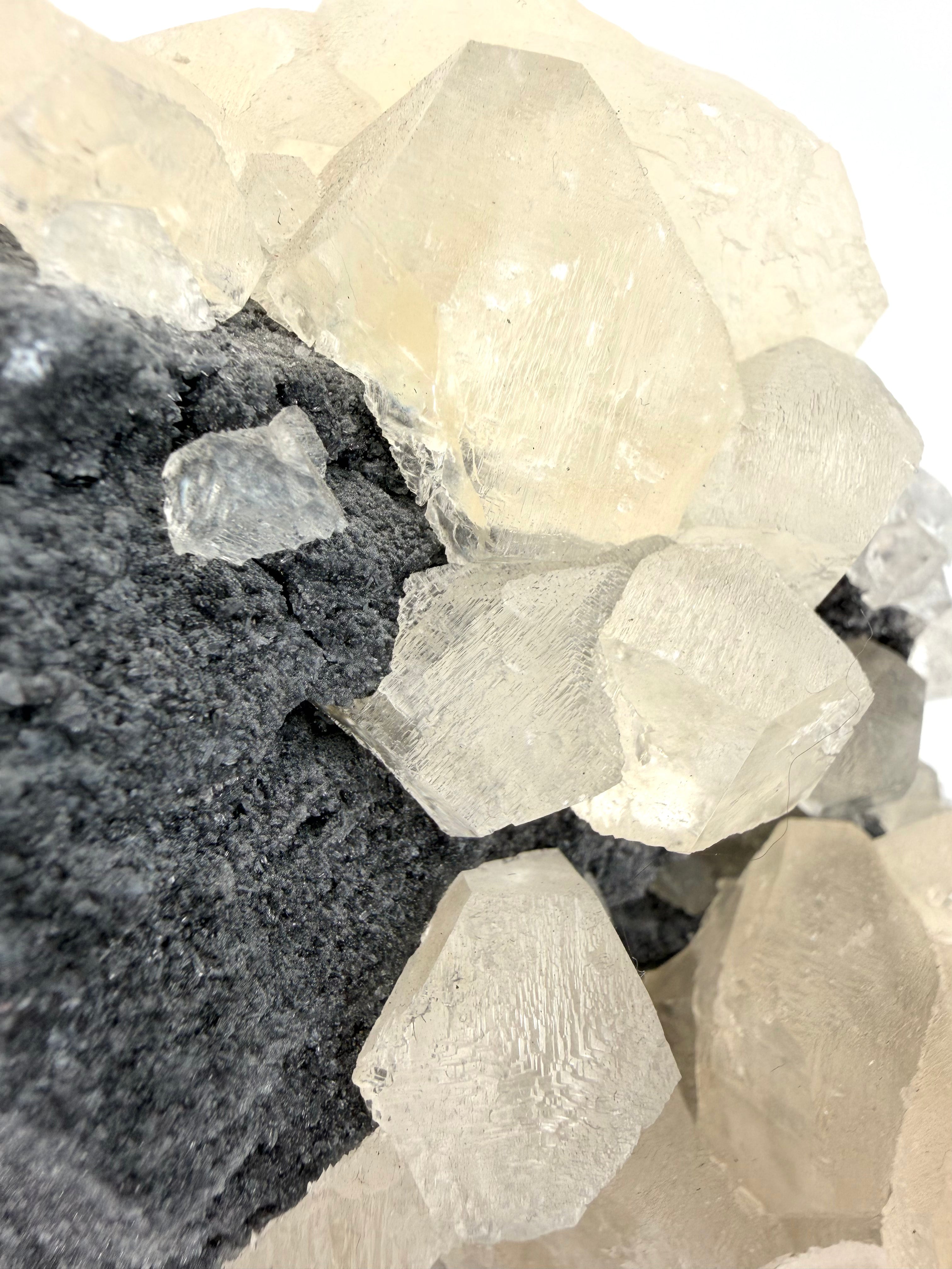 White Stepped “Benz” Calcite on Chalcedony