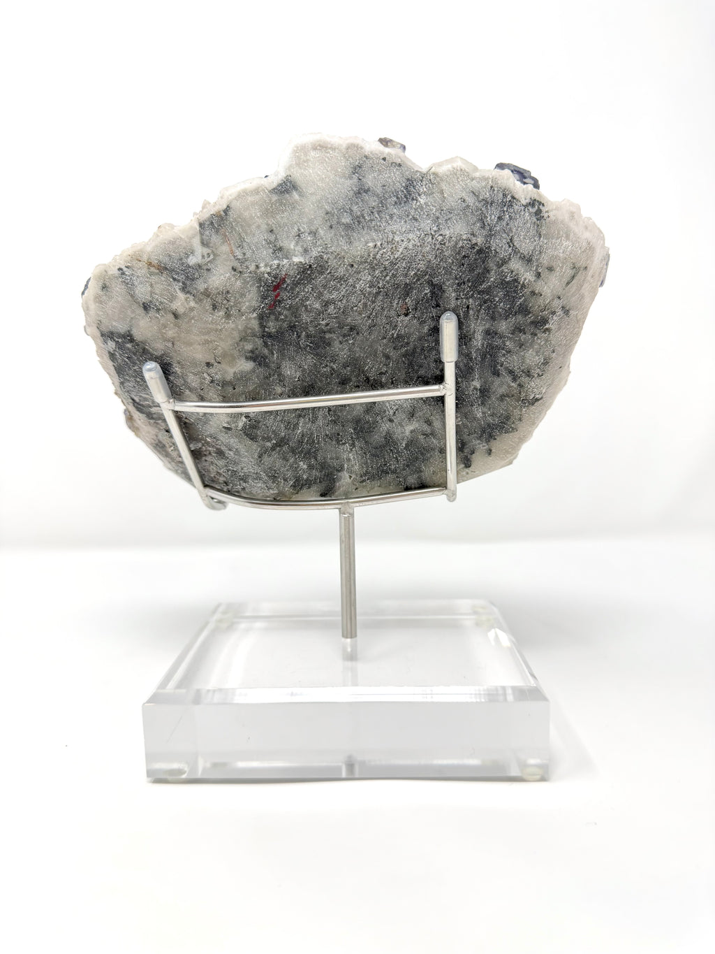 Purple Zoned Fluorite over Milky Candle Quartz