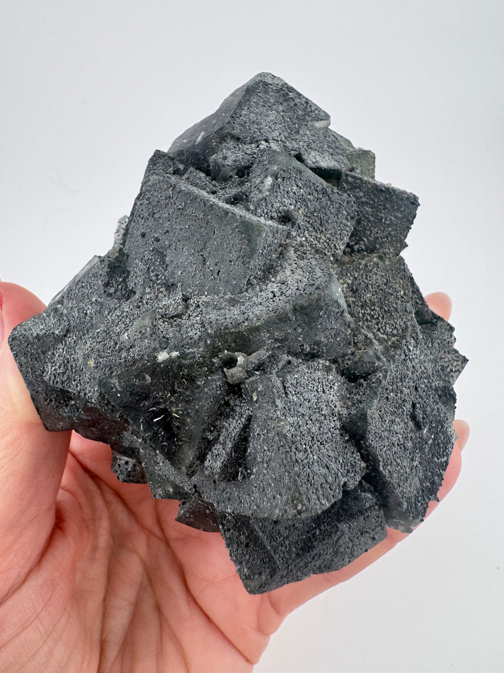 Black Fluorite with Pyrite and Goethite Inclusions from Inner Mongolia
