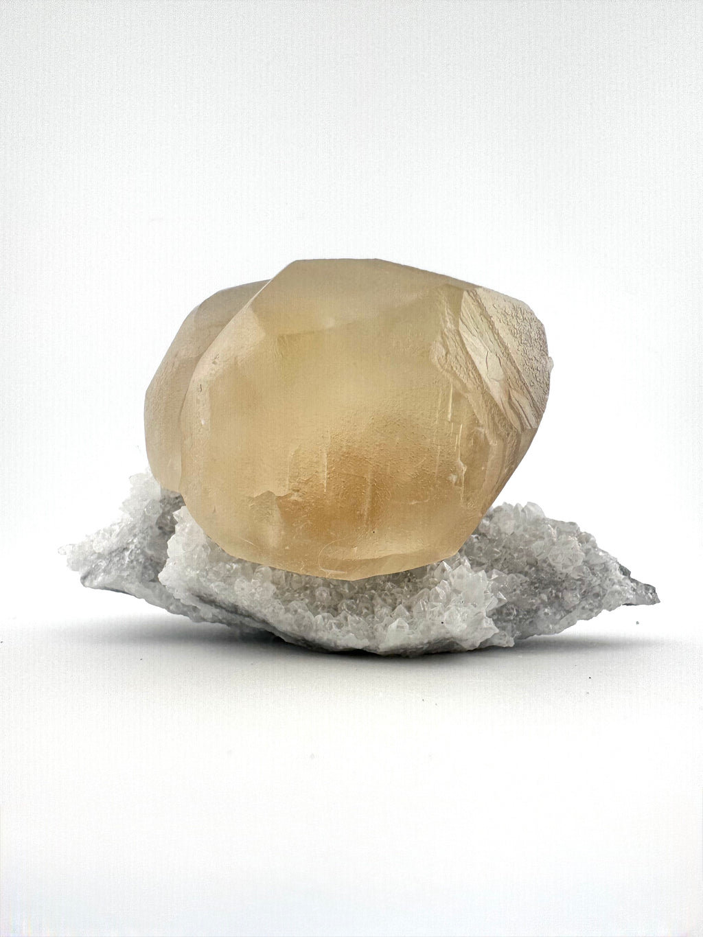 Honey Calcite on Quartz