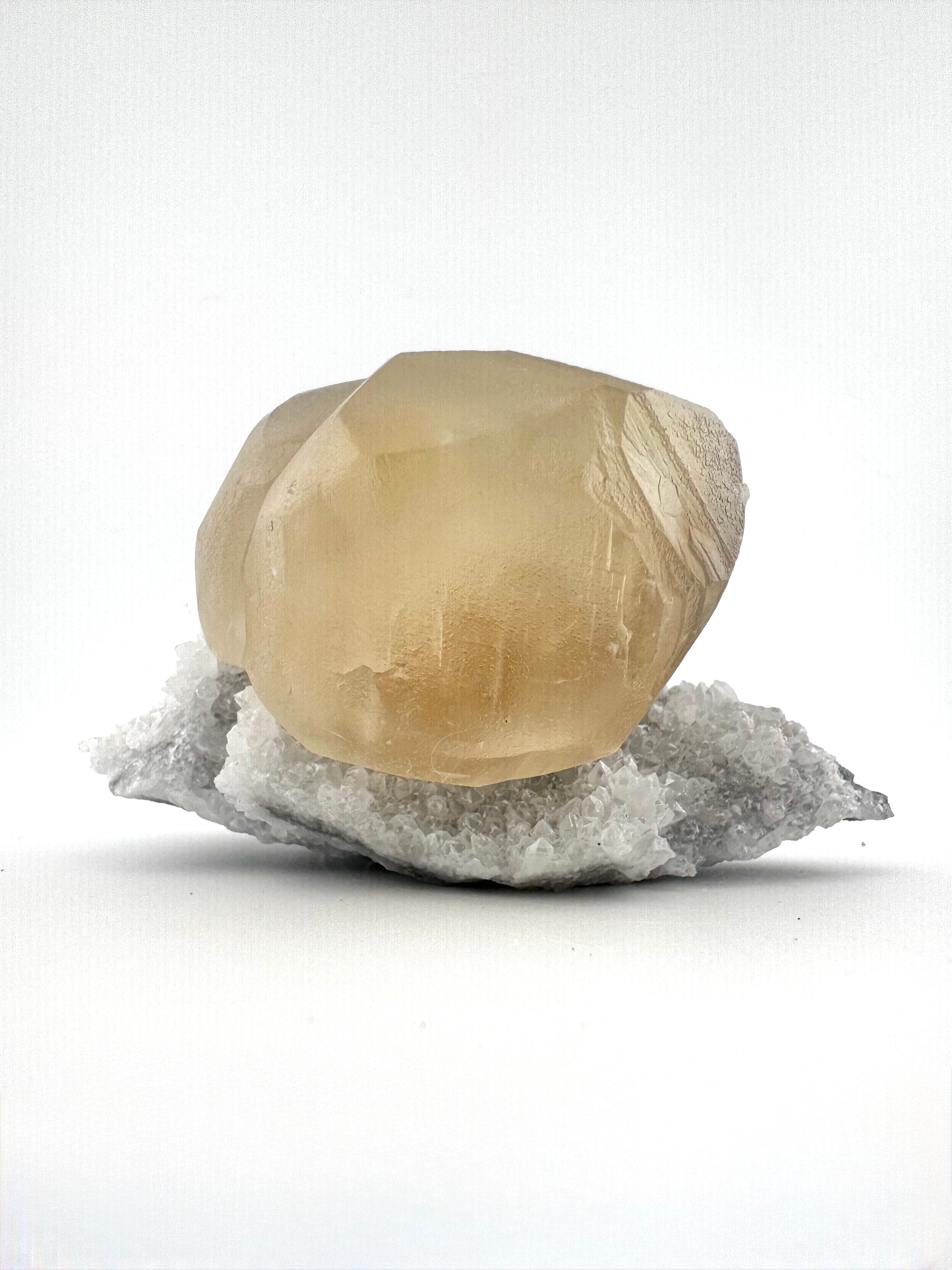 Honey Calcite on Quartz