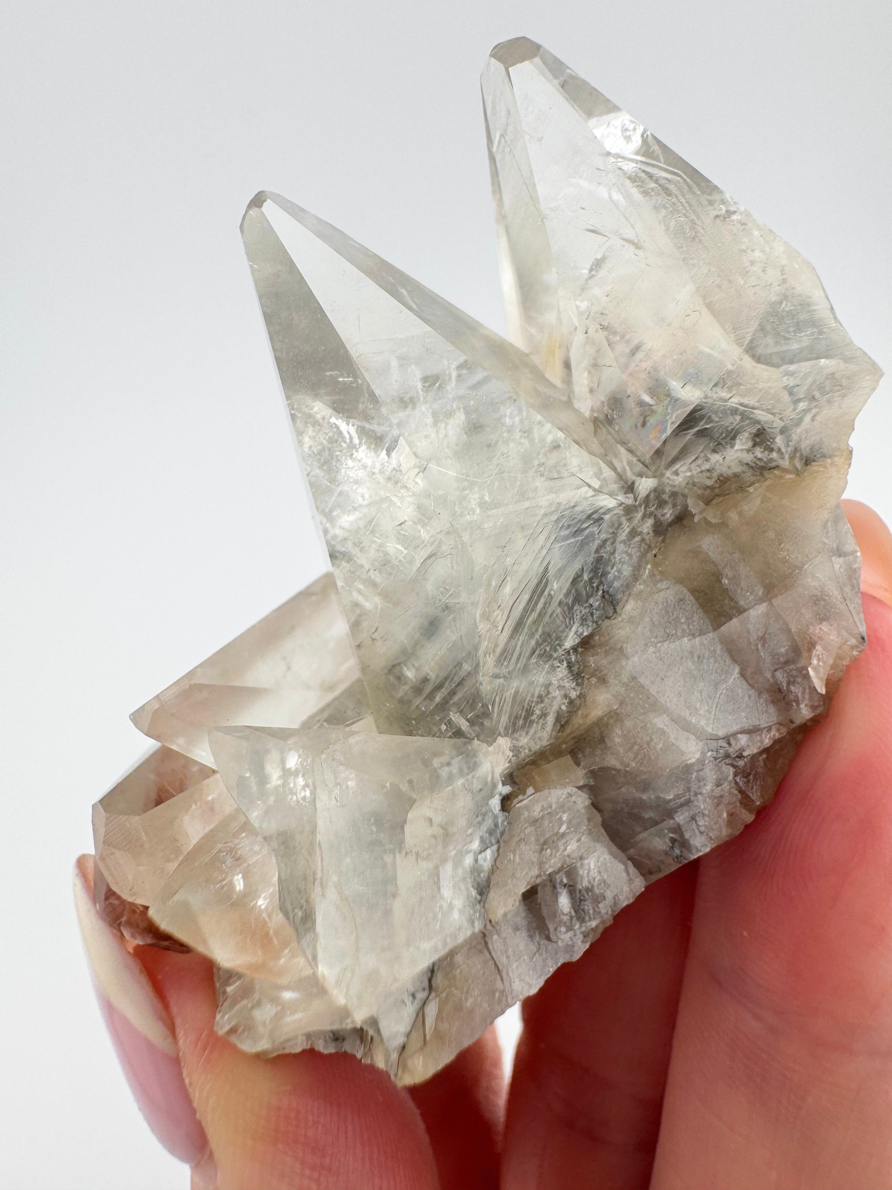 Clear Dogtooth Calcite with Rainbow Inclusions