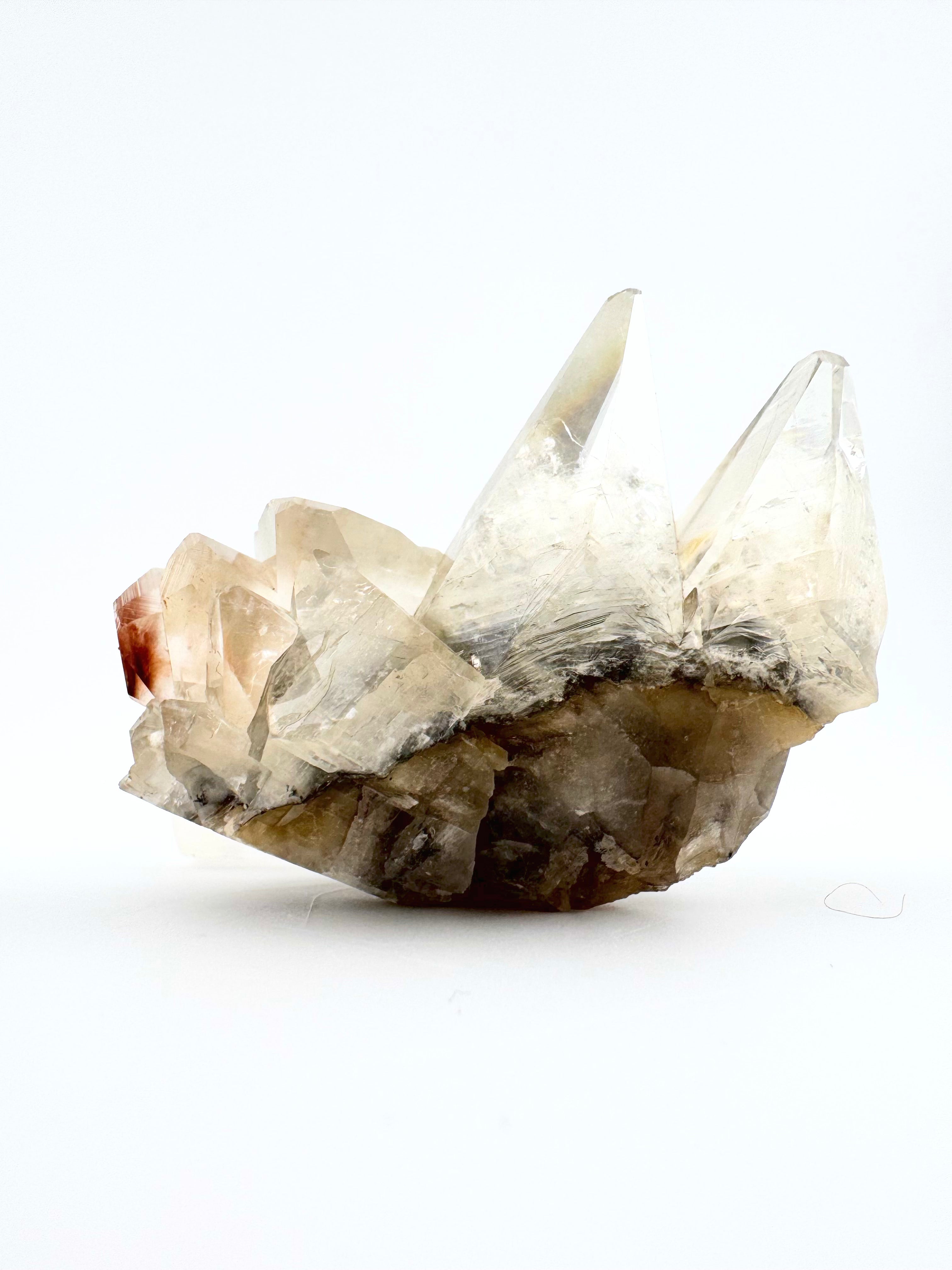 Clear Dogtooth Calcite with Rainbow Inclusions