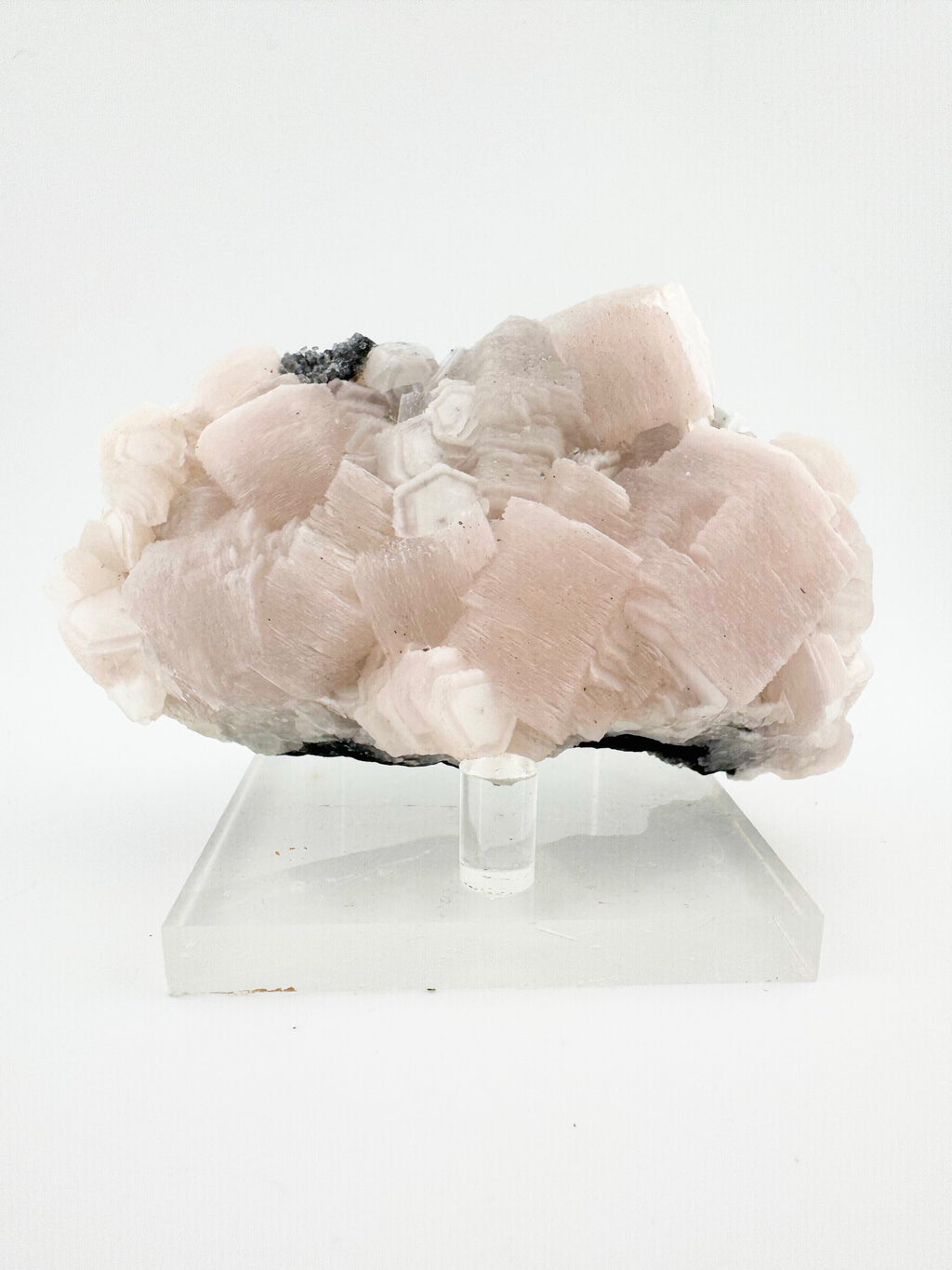 Pink 1000-Layer Coin Calcite Cluster