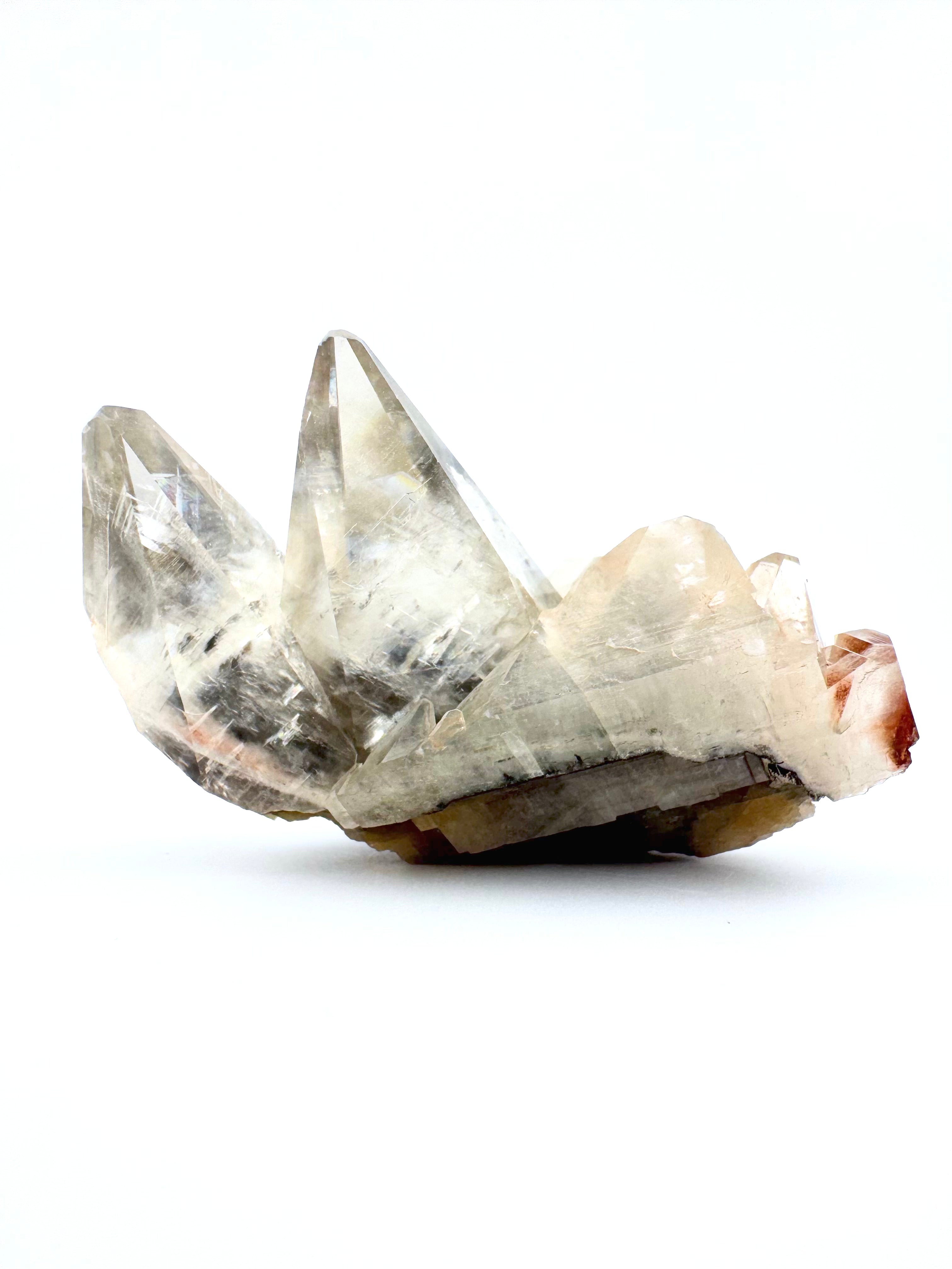 Clear Dogtooth Calcite with Rainbow Inclusions