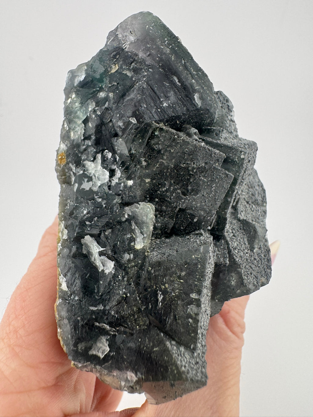 Black Fluorite with Pyrite and Goethite Inclusions from Inner Mongolia