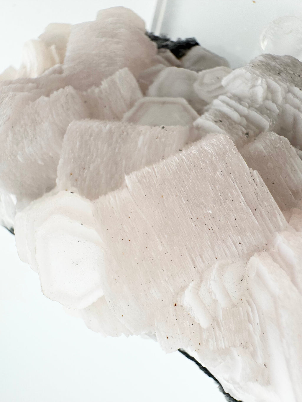 Pink 1000-Layer Coin Calcite Cluster