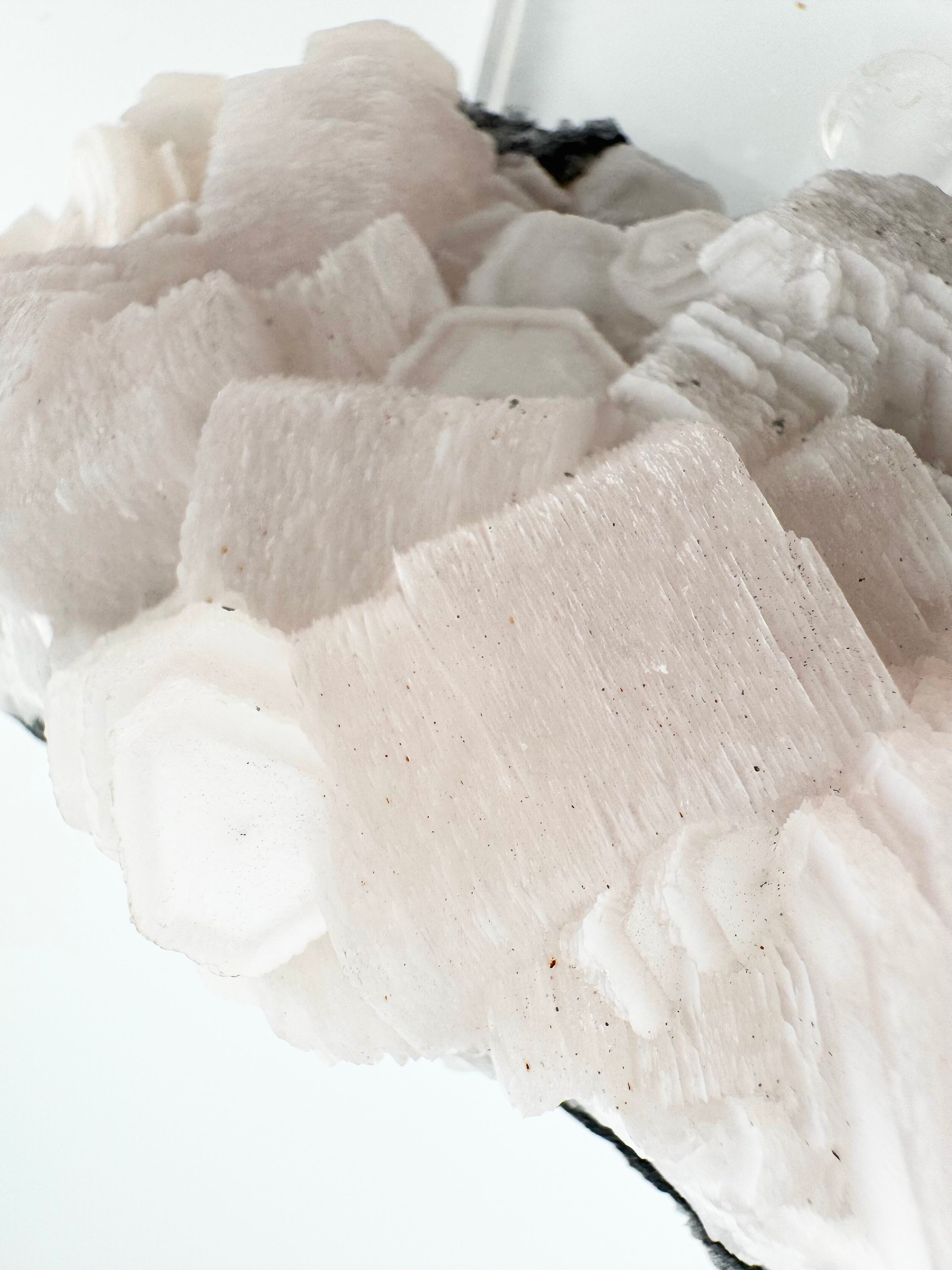 Pink 1000-Layer Coin Calcite Cluster