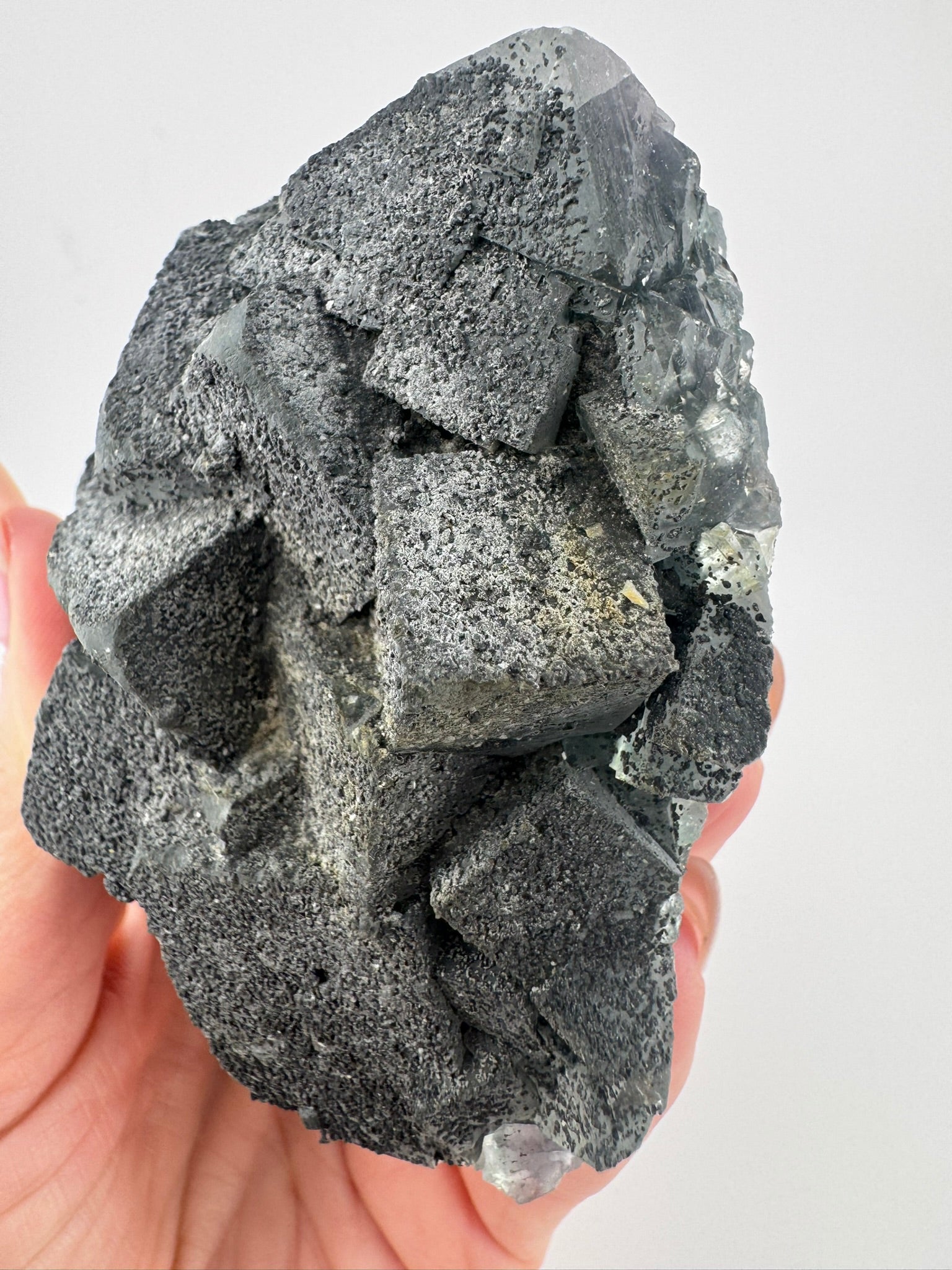 Black Fluorite with Pyrite and Goethite Inclusions from Inner Mongolia