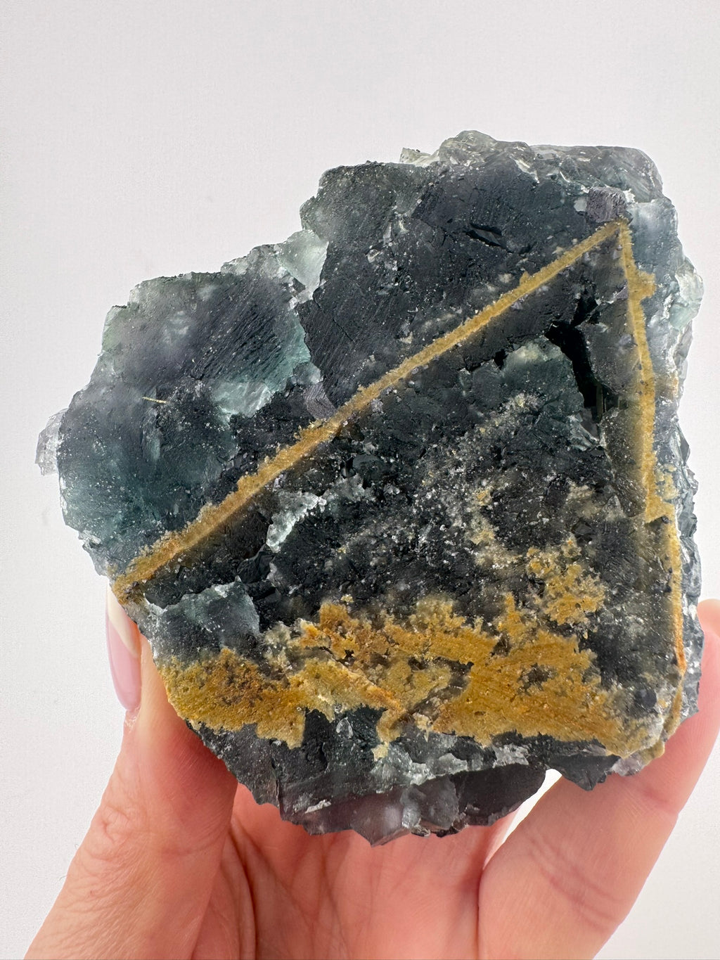 Black Fluorite with Pyrite and Goethite Inclusions from Inner Mongolia